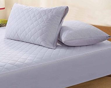 Quilted white pillow protectors
